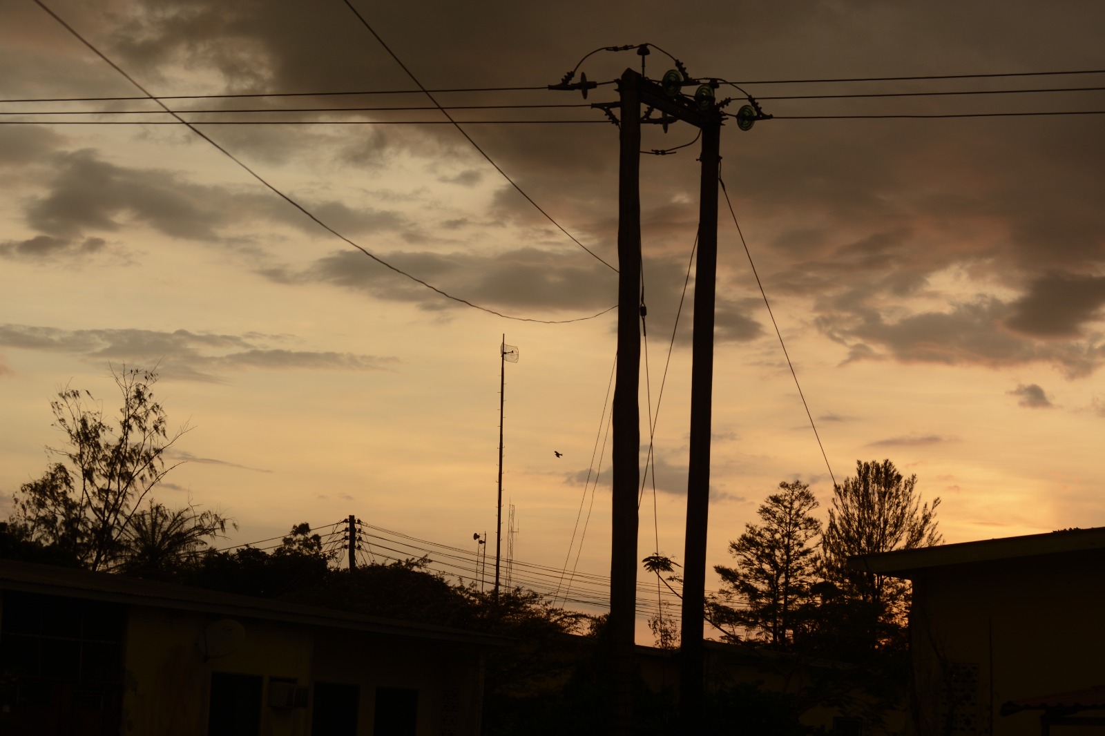 Electricity pole in the dark sky